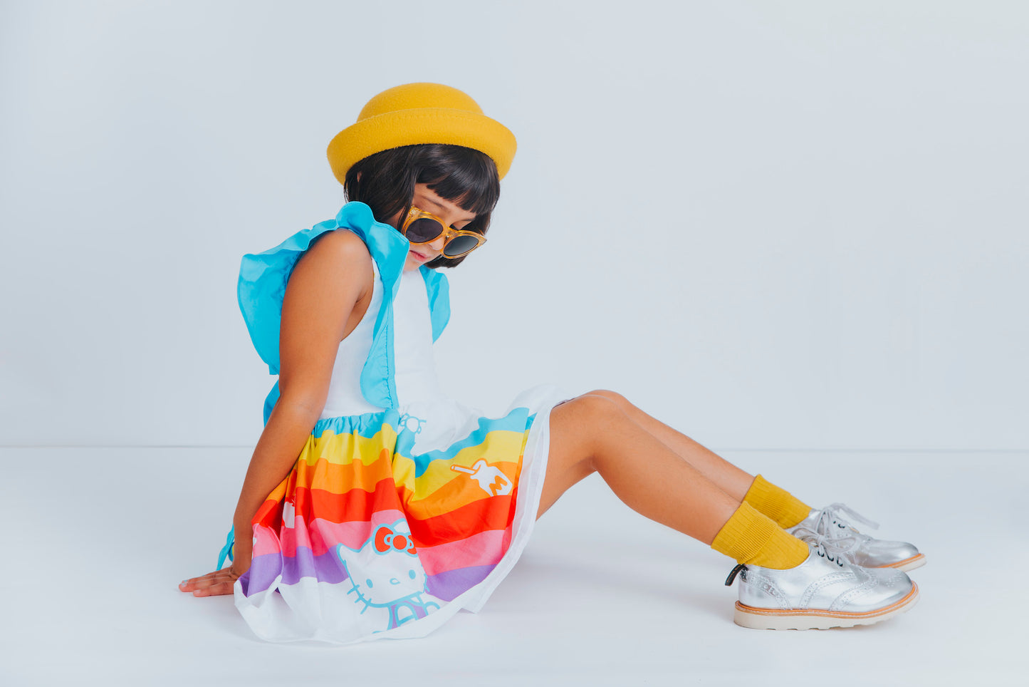 A child posing wearing the hello kitty Hollywood belle