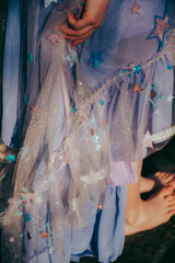 Close up of Pleiades Designs embroidered star ruffles