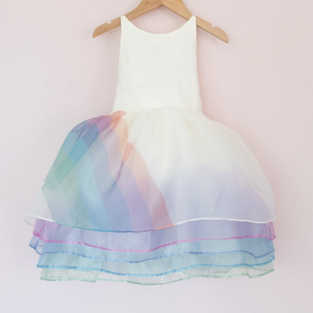 Front of a Pleiades Designs organza shortie dress with a side rainbow and 5 layers