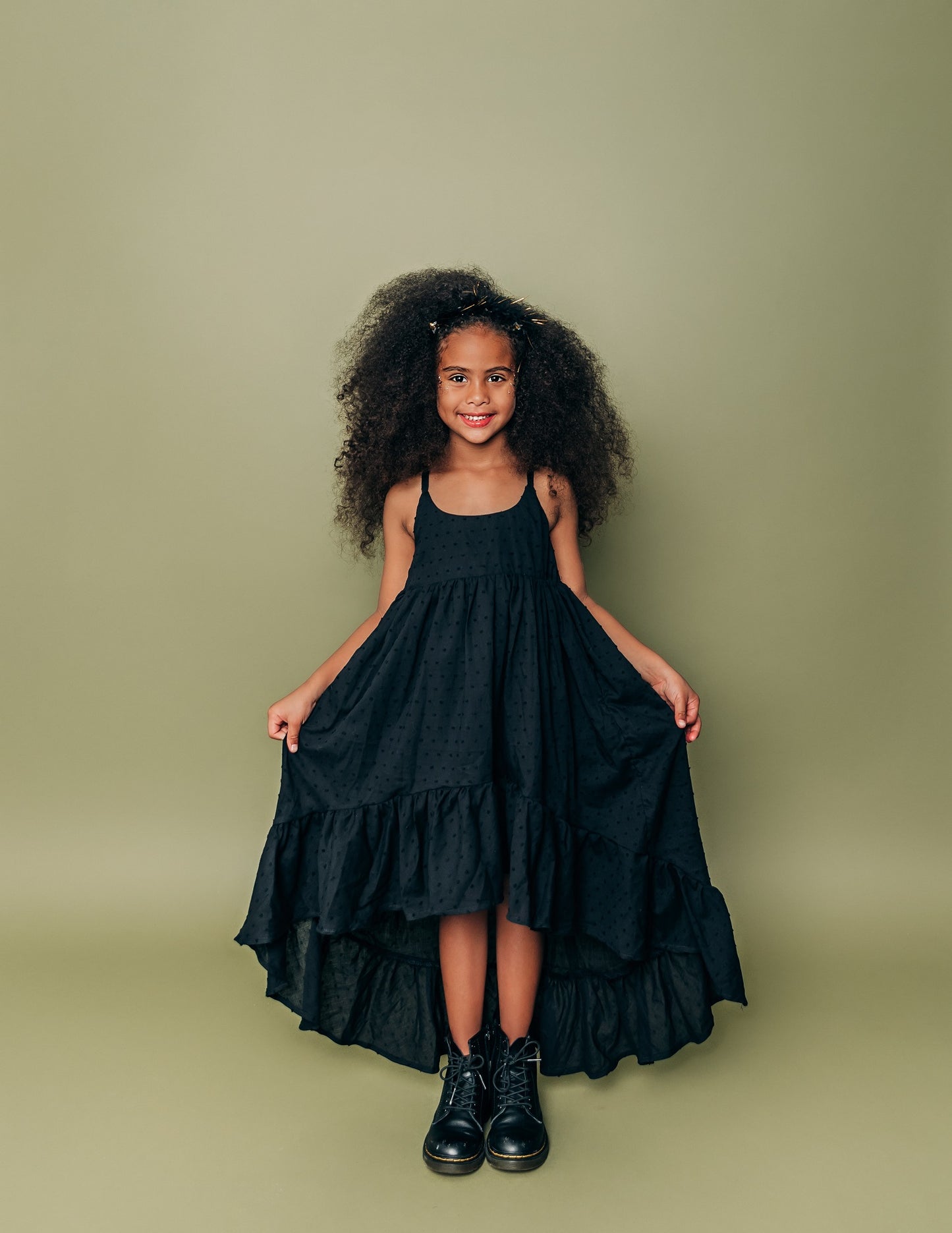 
                  
                    Black Ruffle Hem Windsong
                  
                