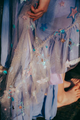 Close up of Pleiades Designs embroidered star ruffles