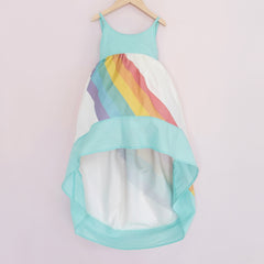 White and aqua high low dress with a bright rainbow across the front and back