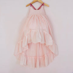 Front of a Pleiades Designs pink clip dot cotton high low dress with a ruffle hem