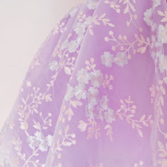 Close up of a Pleiades Designs purple tulle skirt with an embroidered floral layer